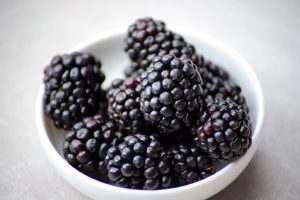 a bowl of freshly picked blackberries